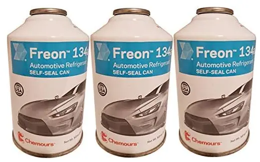 Three 12 oz self-sealing cans of R-134a refrigerant with gauge